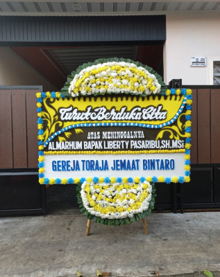 Papan Bunga Duka di Ujuna
